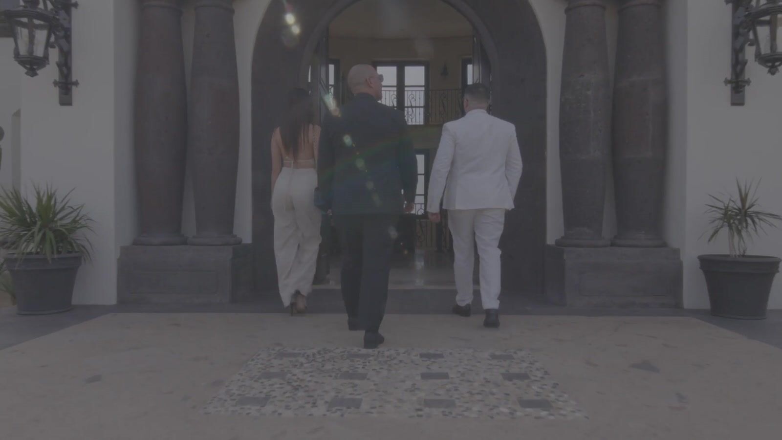 Valentino Sartev walking with clients into a residence in Los Cabos